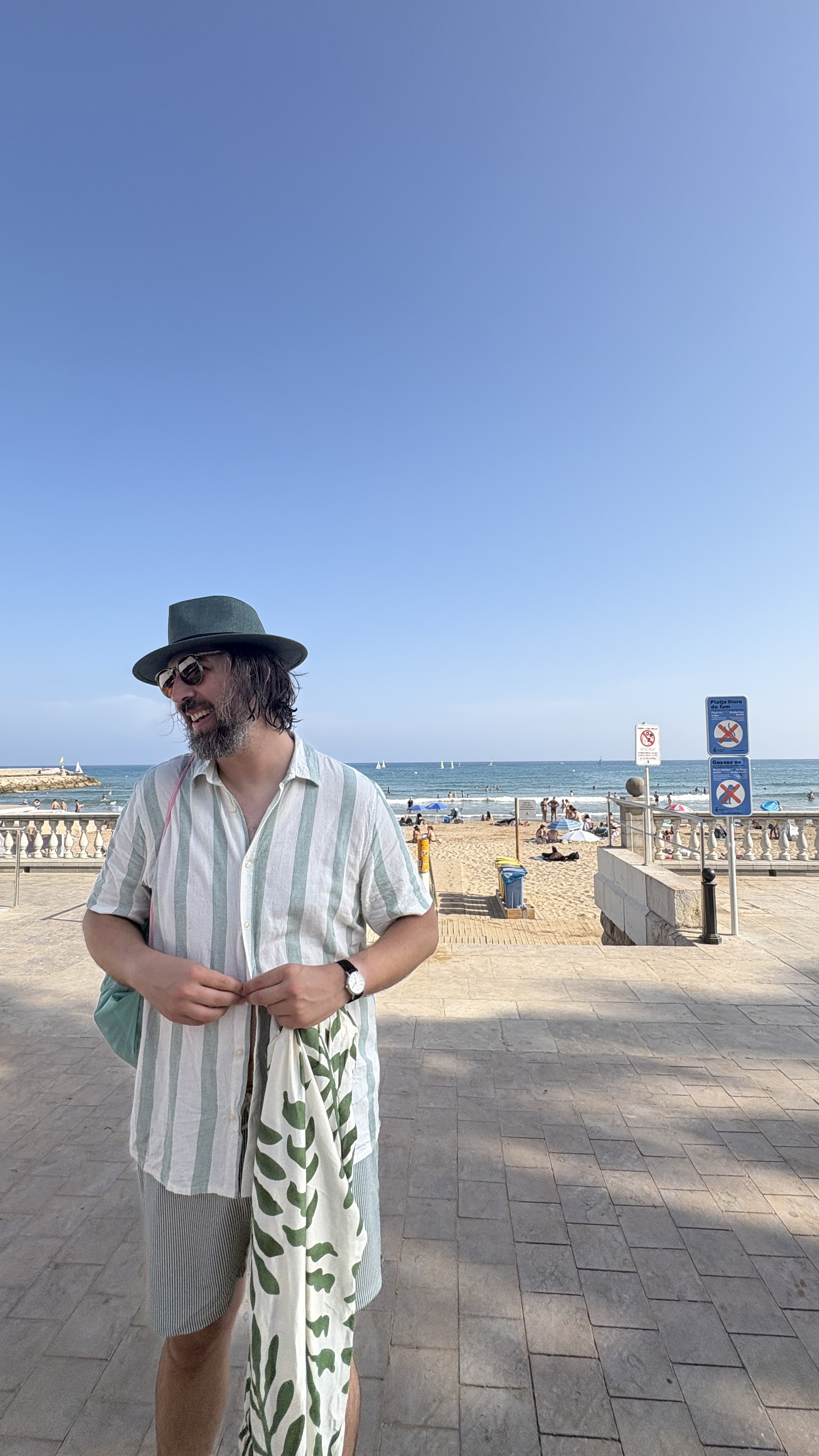Dan Lippert on a beach boardwalk